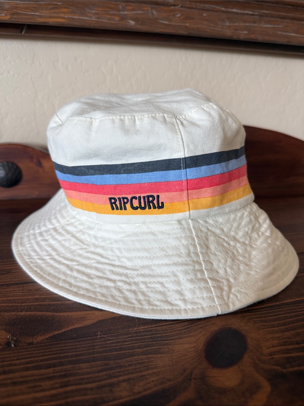 Rip Curl White Bucket Hat with Blue, Red and Yellow Stripes